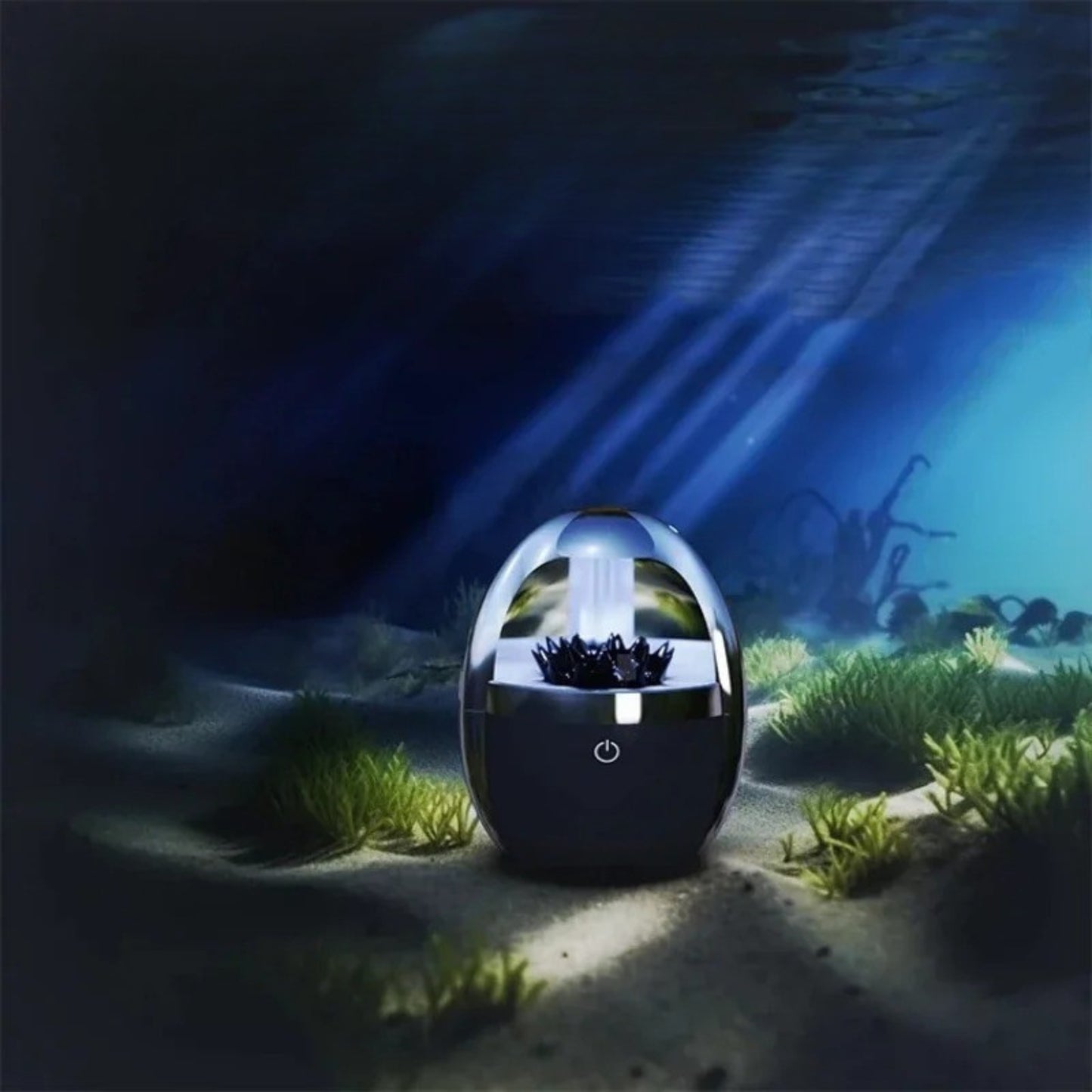 enceinte audio décorative verre transparent avec ferrofluide 